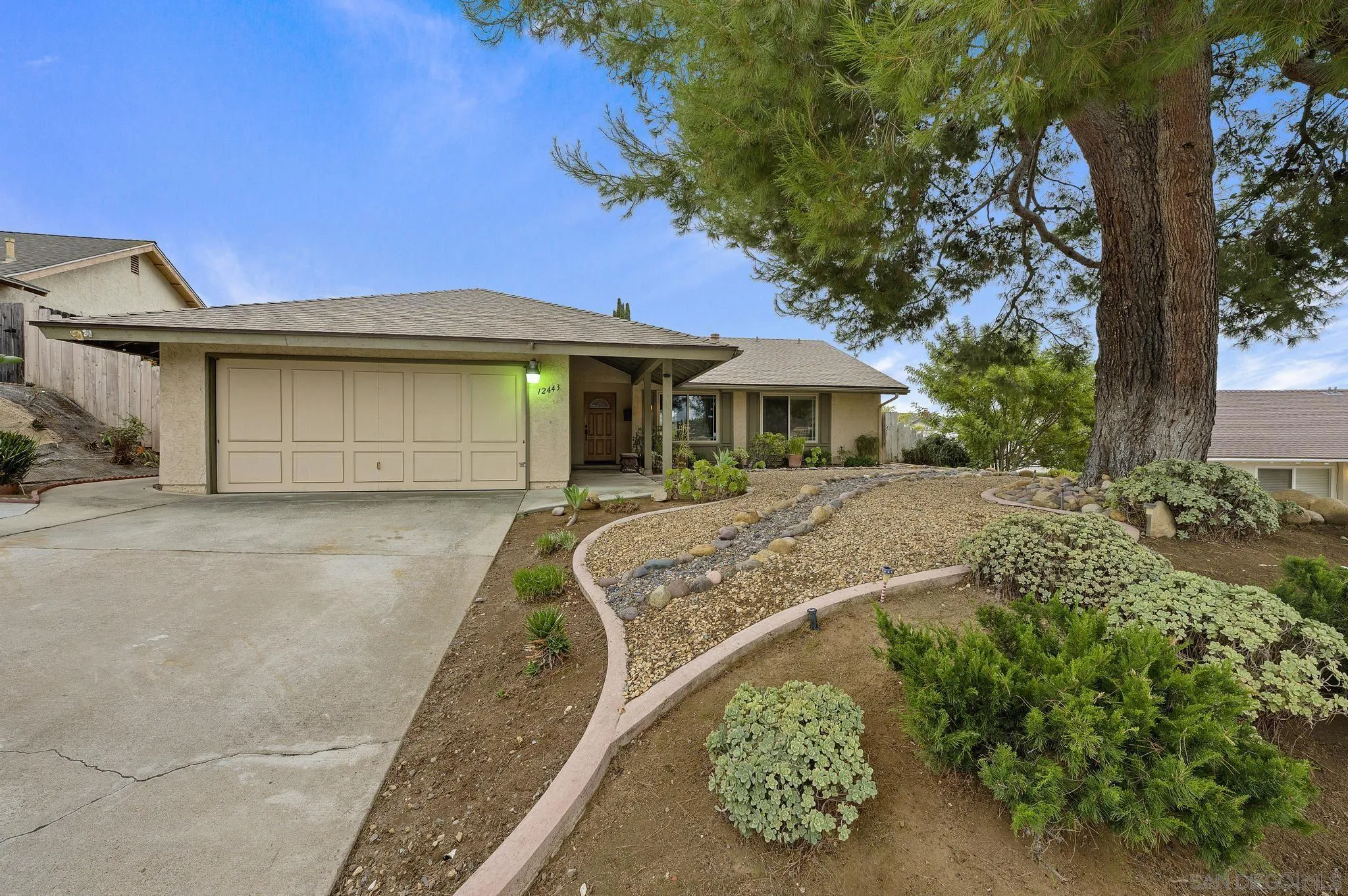12443 McFeron Road Poway, CA 92064 - Photo 1 of 37 a front view of a house with a yard