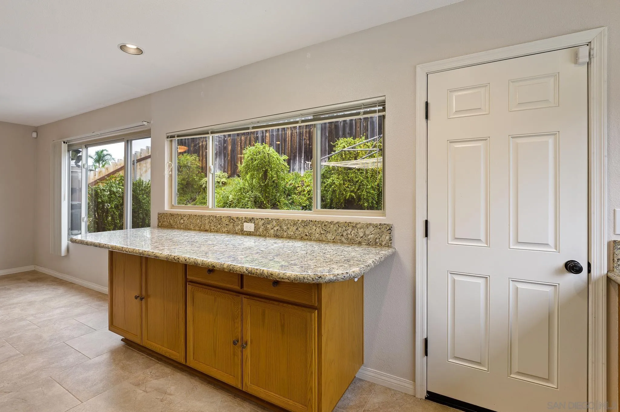 12443 McFeron Road Poway, CA 92064 - Photo 17 of 37 an empty room with a window