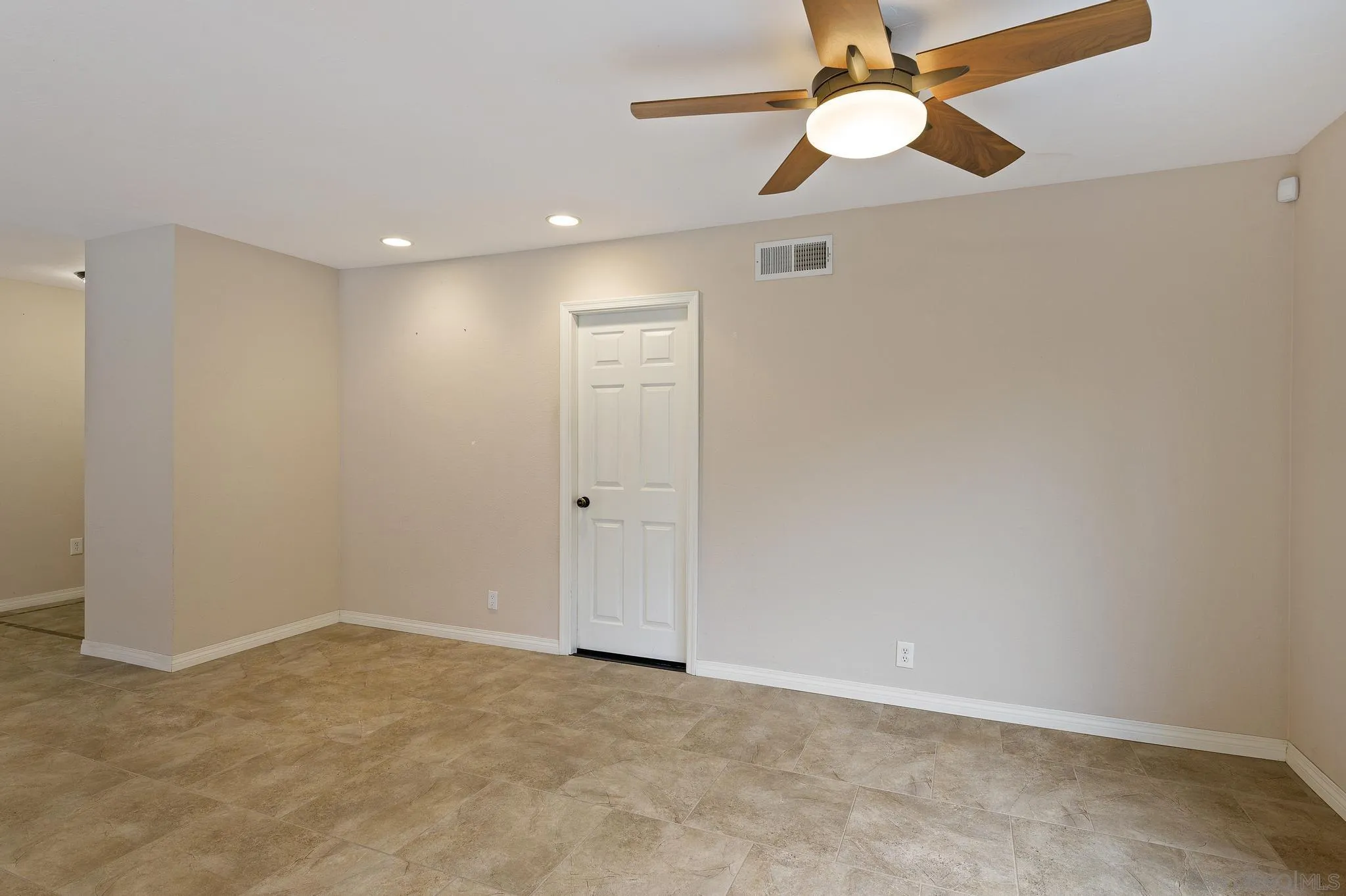12443 McFeron Road Poway, CA 92064 - Photo 20 of 37 an empty room with closet and a chandelier fan