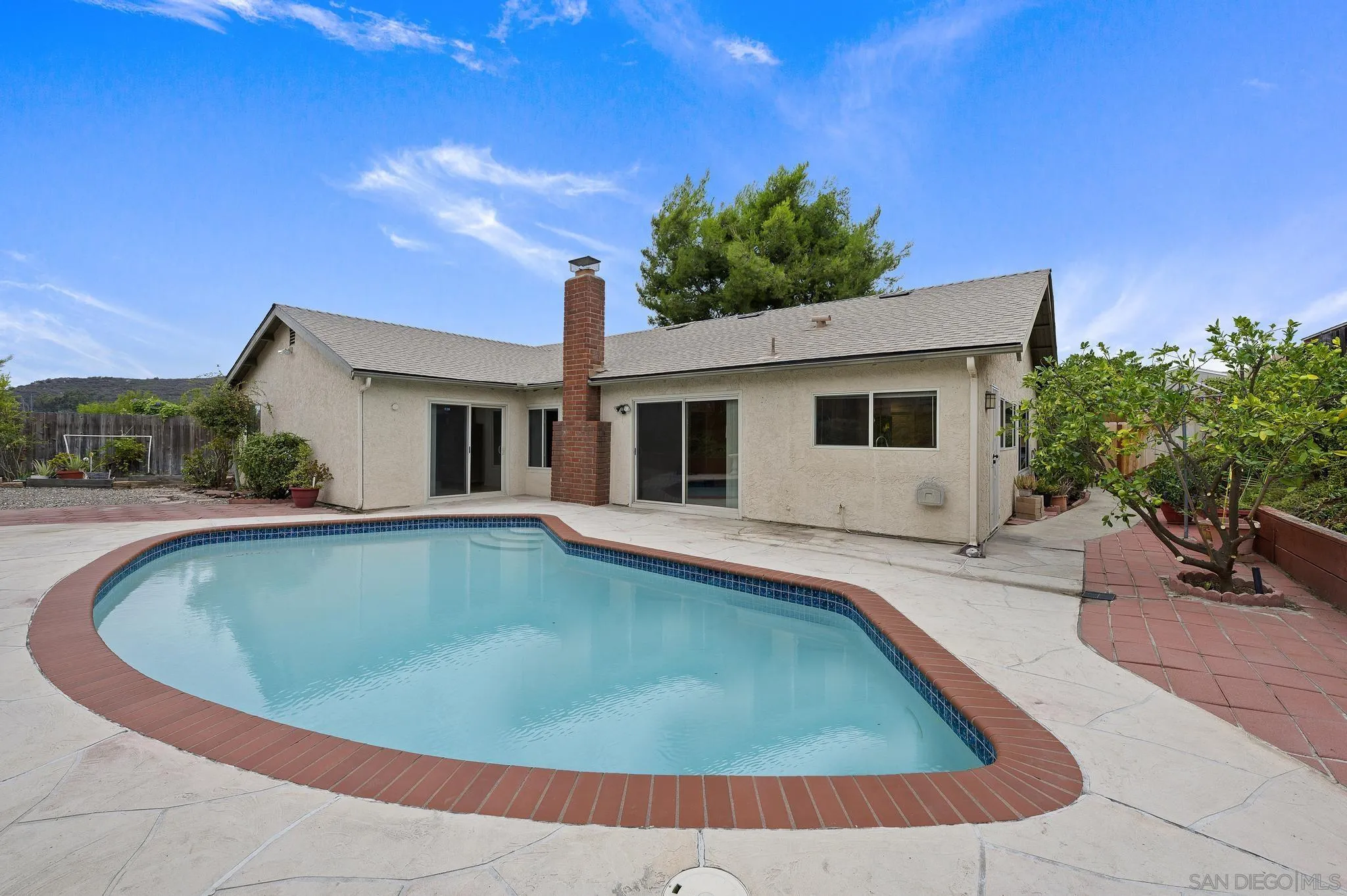12443 McFeron Road Poway, CA 92064 - Photo 2 of 37 a view of outdoor space yard swimming pool and porch