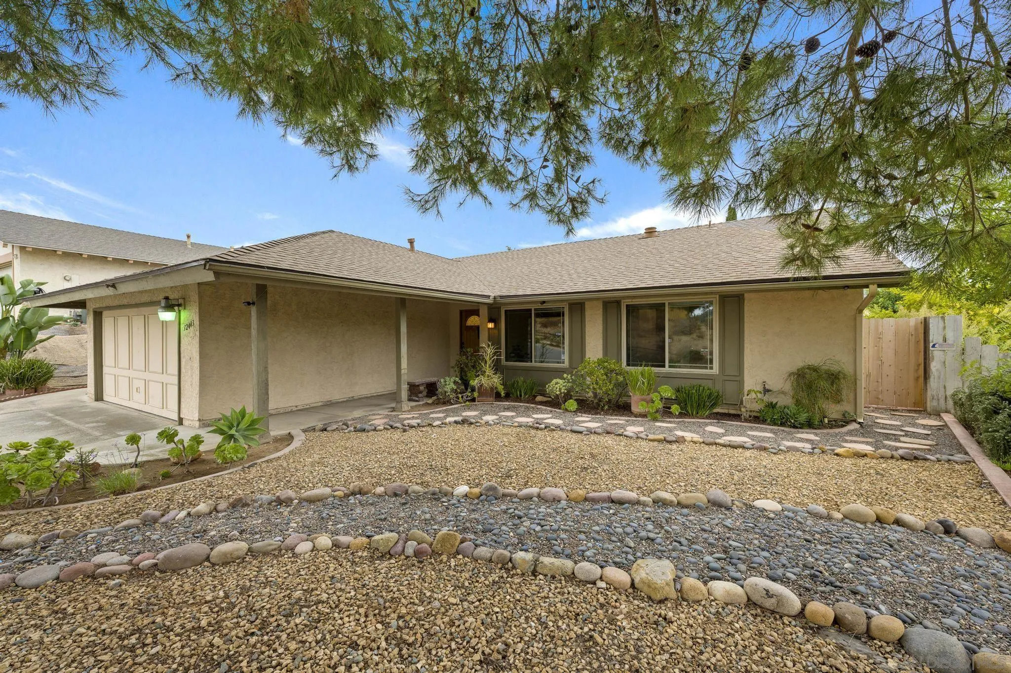 12443 McFeron Road Poway, CA 92064 - Photo 26 of 37 a front view of a house with a yard