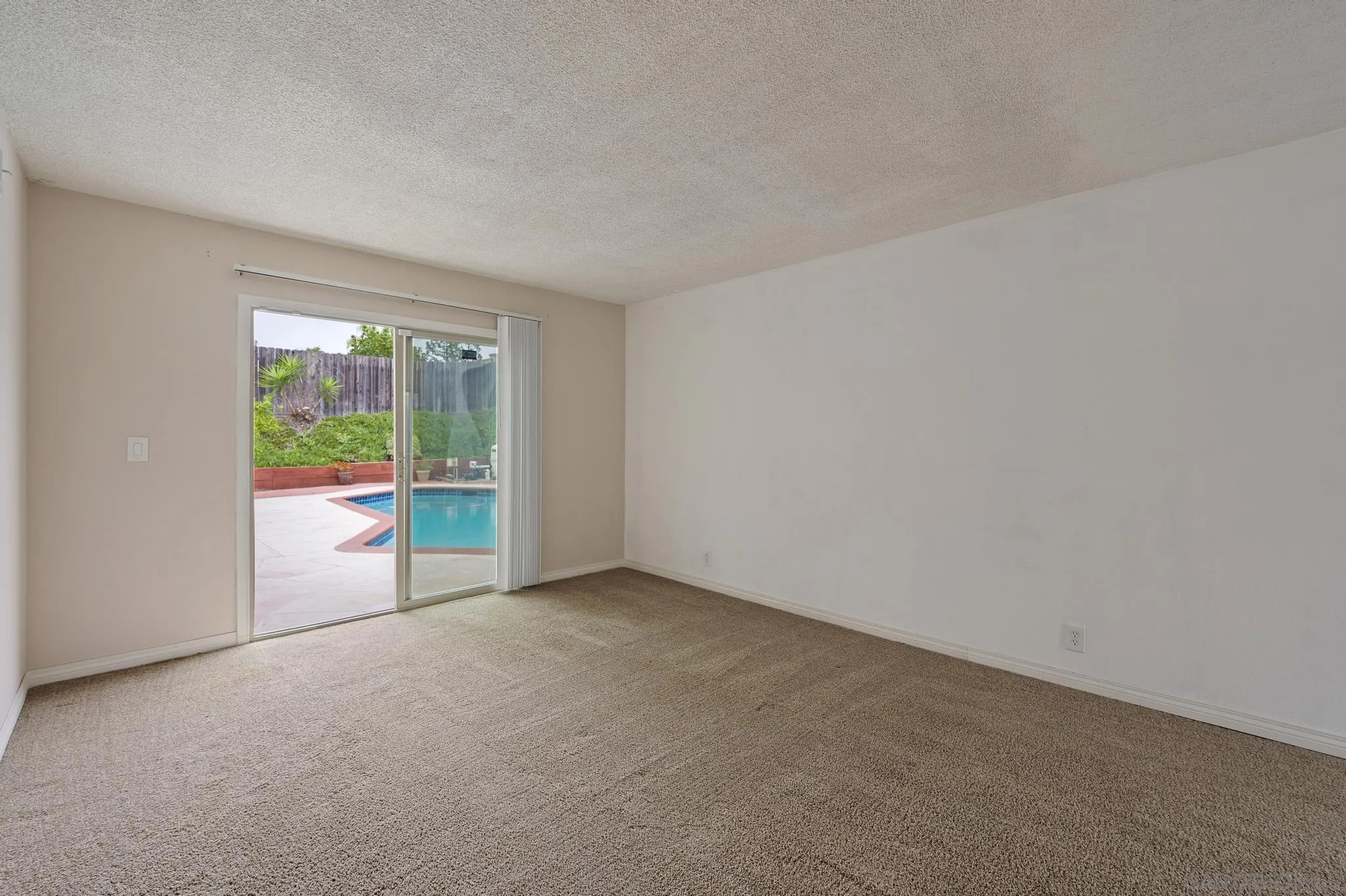 12443 McFeron Road Poway, CA 92064 - Photo 3 of 37 a view of an empty room and window