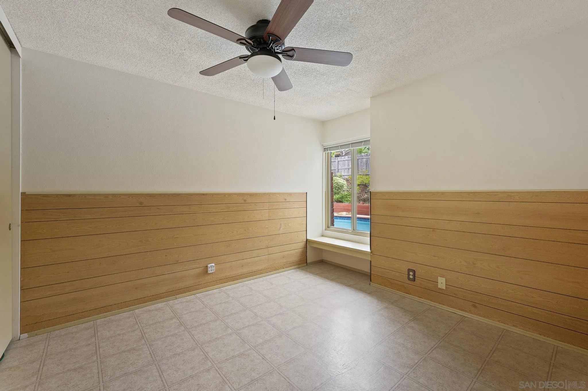 12443 McFeron Road Poway, CA 92064 - Photo 31 of 37 a view of an empty room and window