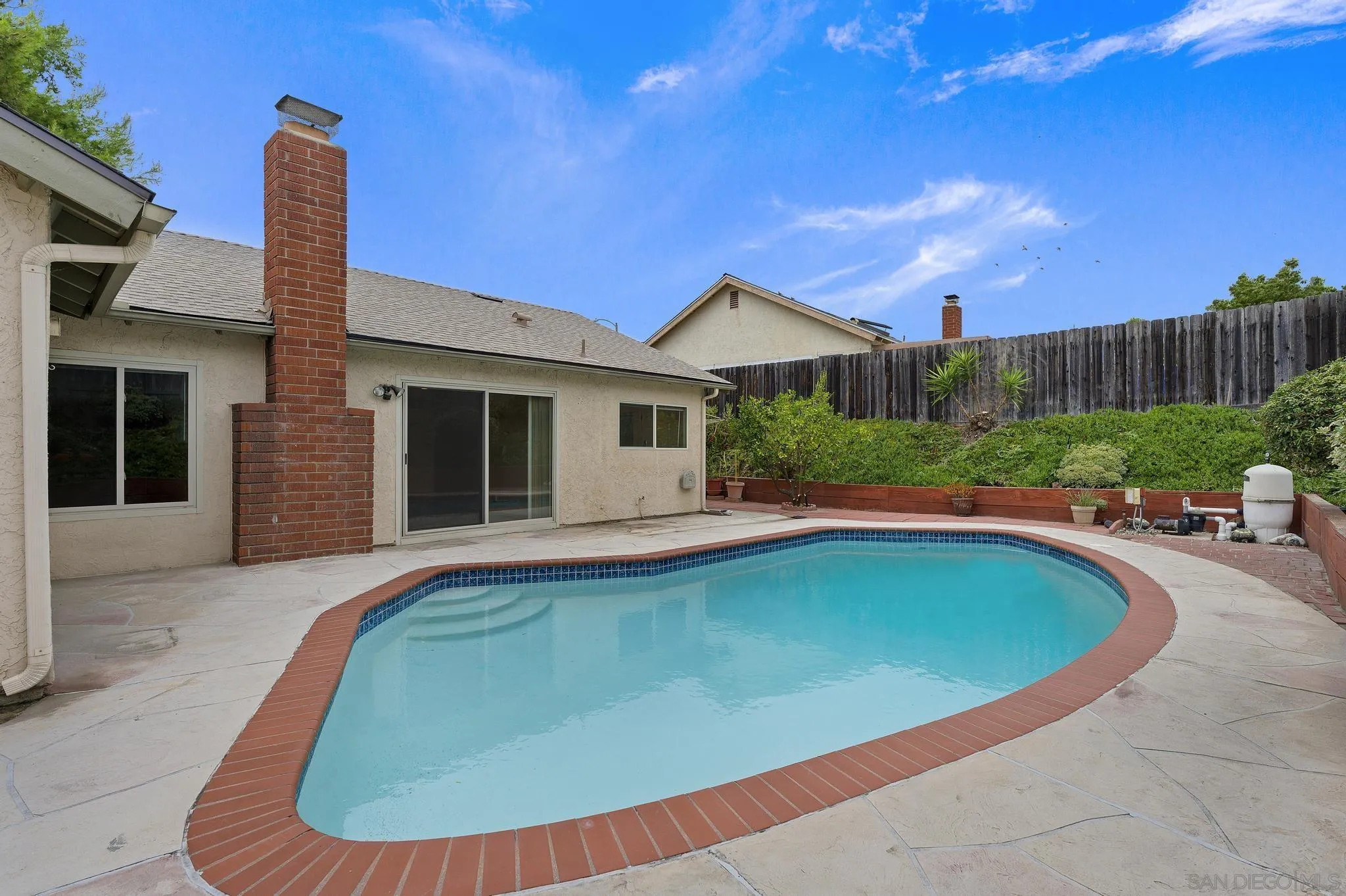 12443 McFeron Road Poway, CA 92064 - Photo 34 of 37 a view of a house with swimming pool and sitting area