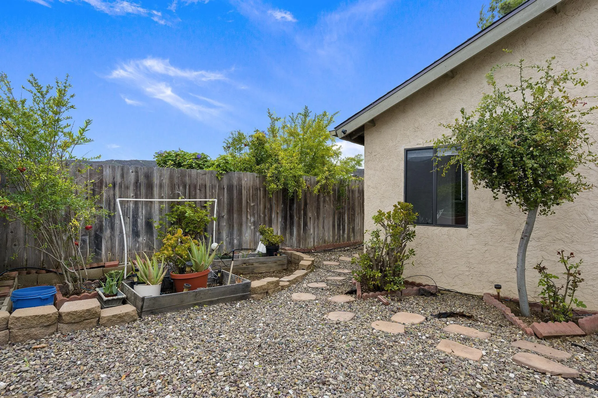 12443 McFeron Road Poway, CA 92064 - Photo 35 of 37 a garden view with a seating space