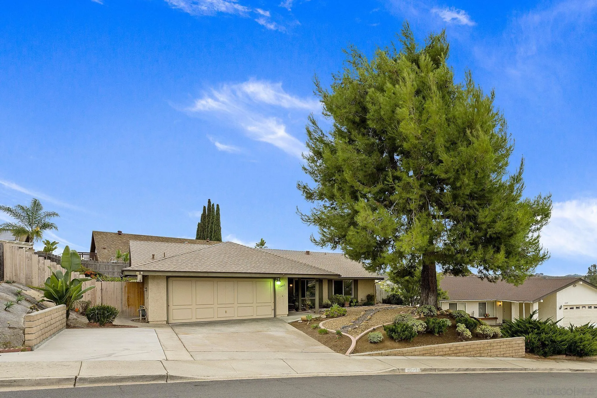 12443 McFeron Road Poway, CA 92064 - Photo 6 of 37 a front view of a house