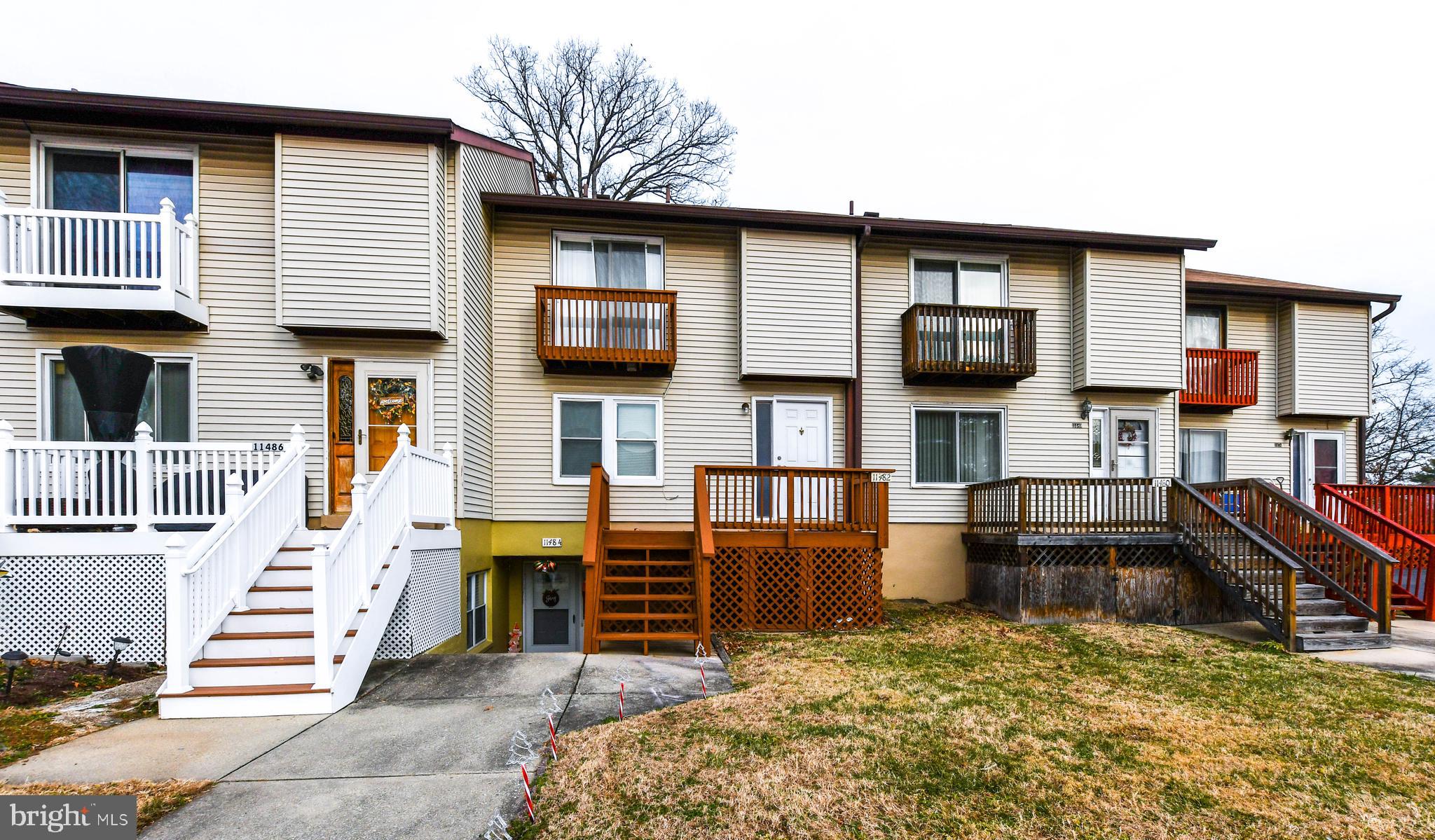 a house view with a backyard space