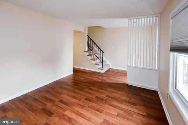 a view of entryway with wooden floor