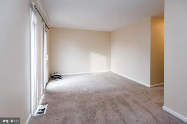 a view of a livingroom with an entryway