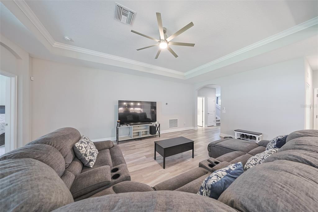 130 Azul Drive Seffner, FL 33584 - Photo 11 of 47 a living room with furniture and a flat screen tv