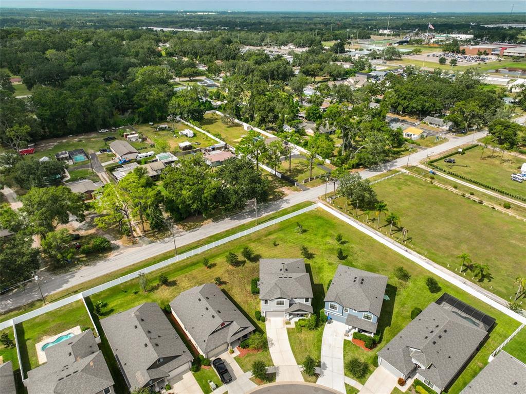 130 Azul Drive Seffner, FL 33584 - Photo 47 of 47 an aerial view of a residential houses with outdoor space and trees