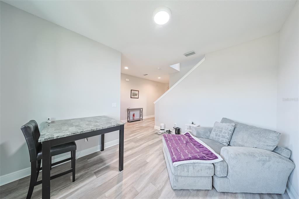 130 Azul Drive Seffner, FL 33584 - Photo 6 of 47 a living room with furniture and wooden floor
