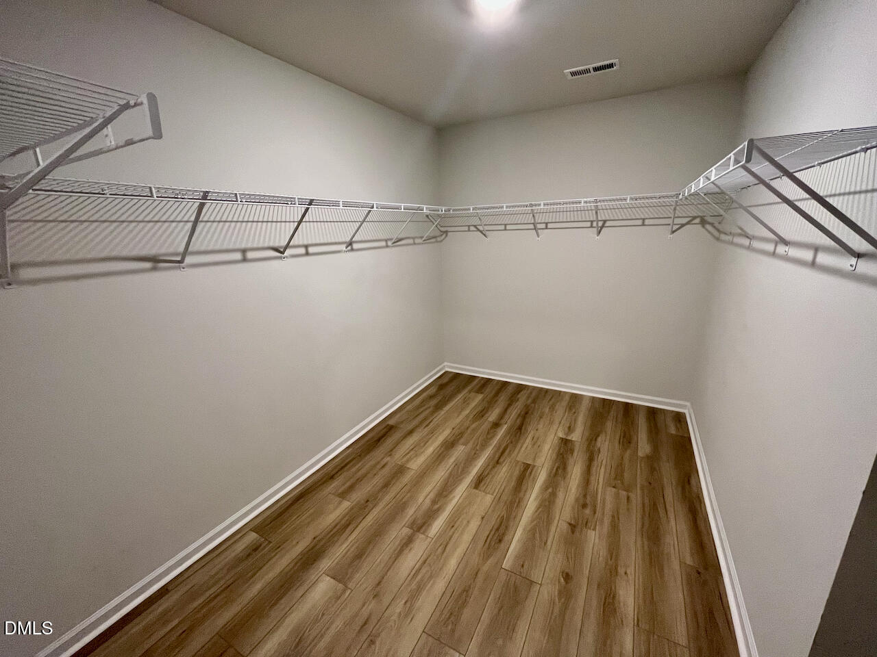 924 Peninsula Place Knightdale, NC 27545 - Photo 14 of 22 a view of a room with racks on the wall