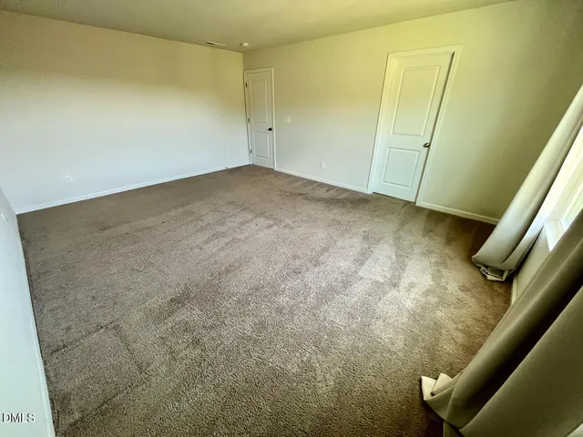 a view of empty room with window