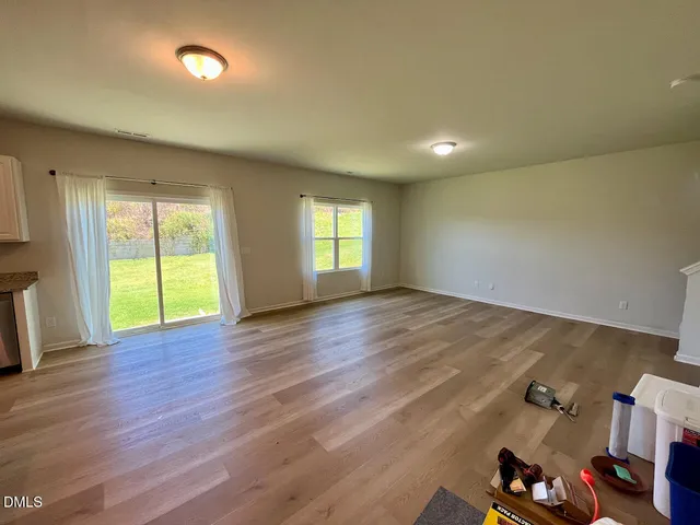 an empty room with windows