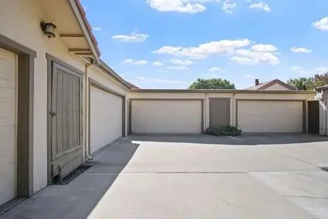 a view of front door and small yard