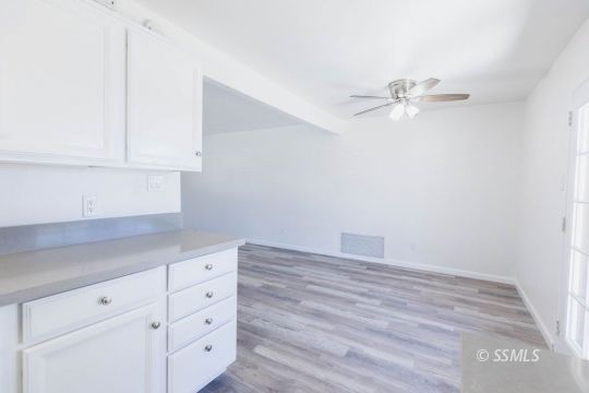 901 West Rader Avenue Ridgecrest, CA 93555 - Photo 11 of 26 wooden floor in an empty room