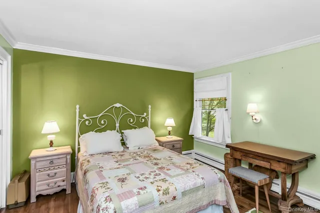 a bedroom with a bed and furniture