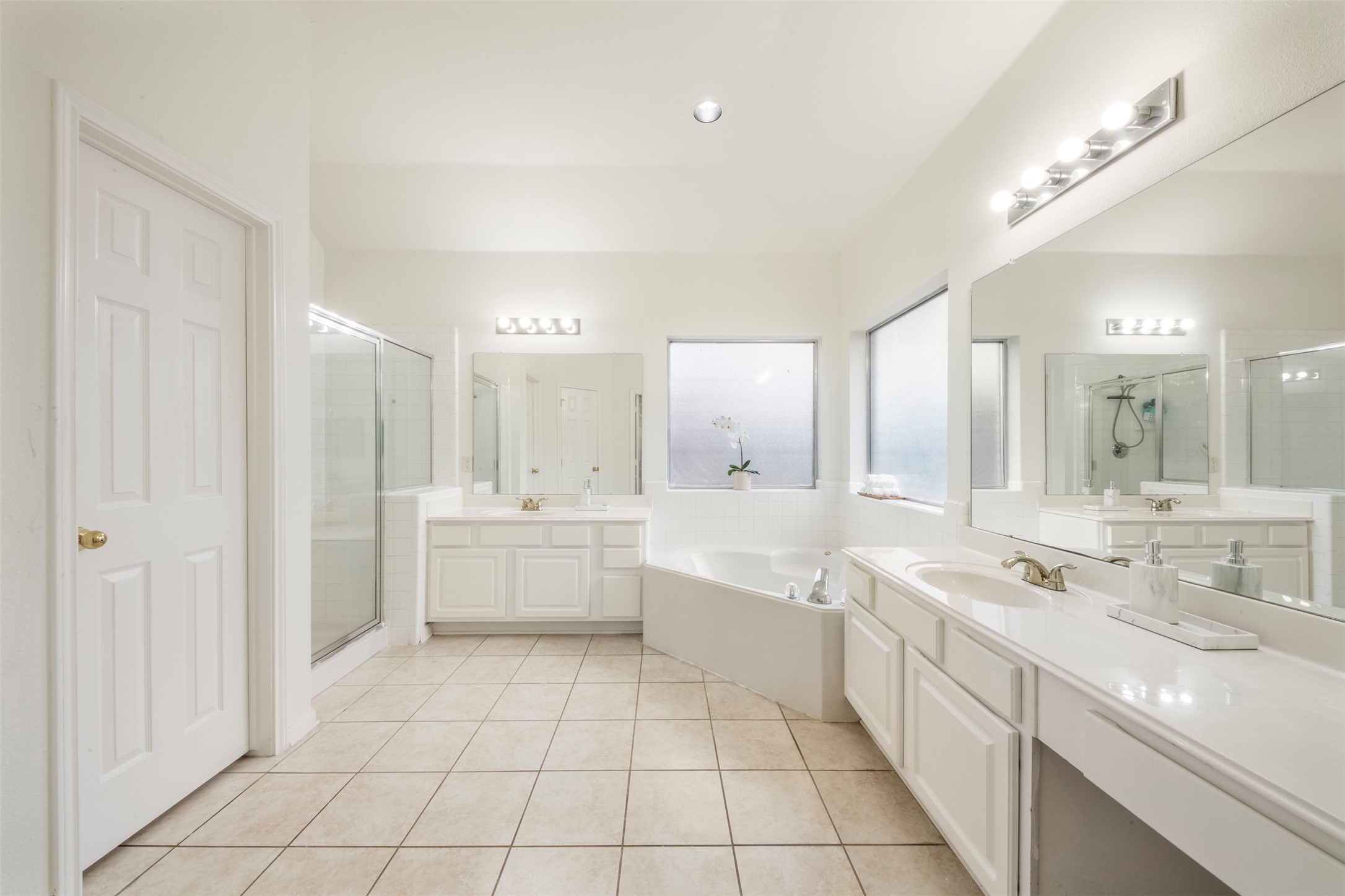 9211 Memorial Hills Drive Spring, TX 77379 - Photo 10 of 33 Double sink primary bathroom, separate tub and walk in shower