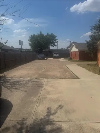 a view of terrace with yard