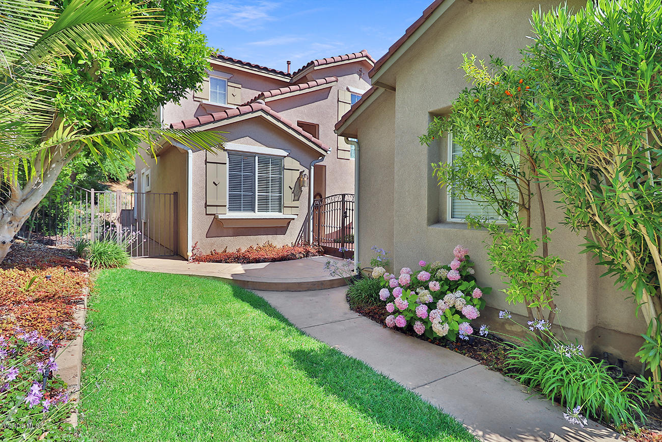 143 Brooks Road Simi Valley, CA 93065 - Photo 2 of 42 a view of a house with a yard and garden
