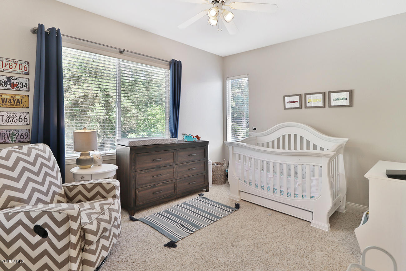 143 Brooks Road Simi Valley, CA 93065 - Photo 24 of 42 a bedroom with furniture and a window
