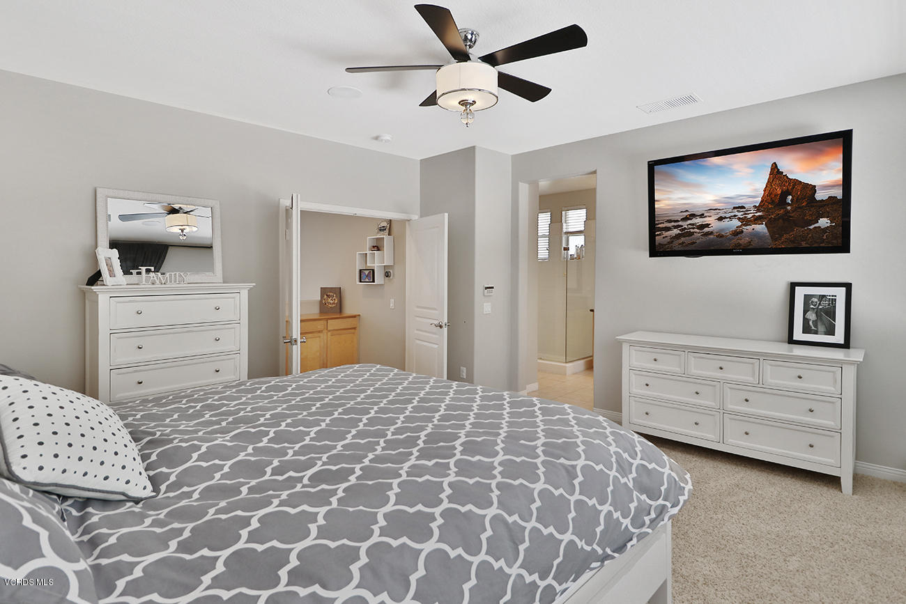 143 Brooks Road Simi Valley, CA 93065 - Photo 27 of 42 a bedroom with a bed and a dresser