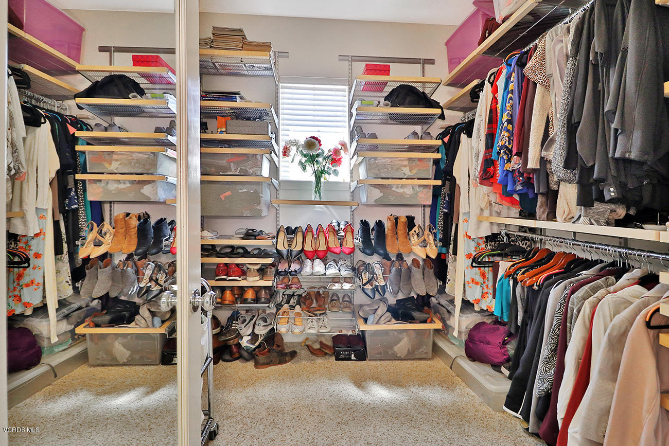 143 Brooks Road Simi Valley, CA 93065 - Photo 32 of 42 a view of walk in closet with clothes and shoes