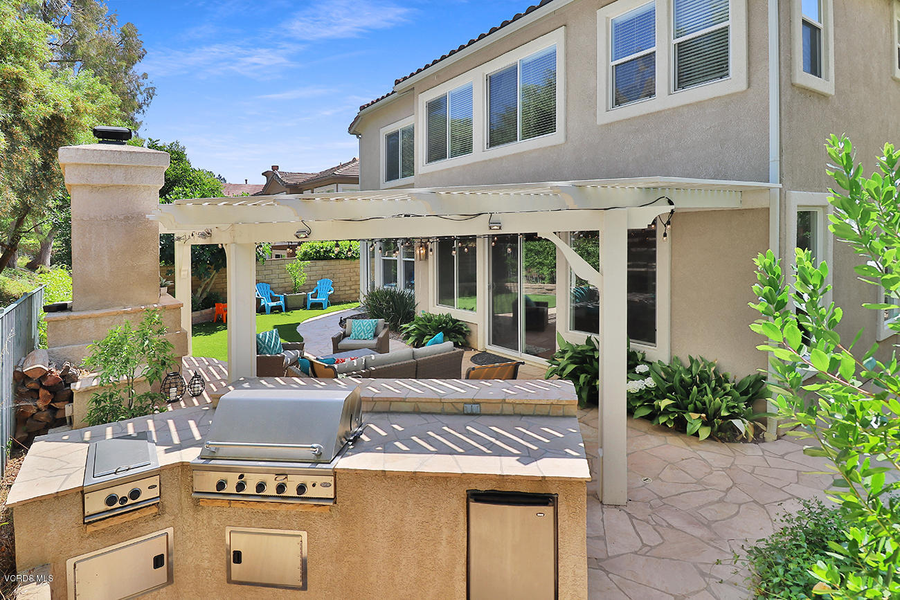 143 Brooks Road Simi Valley, CA 93065 - Photo 33 of 42 a view of a house with sitting area and garden