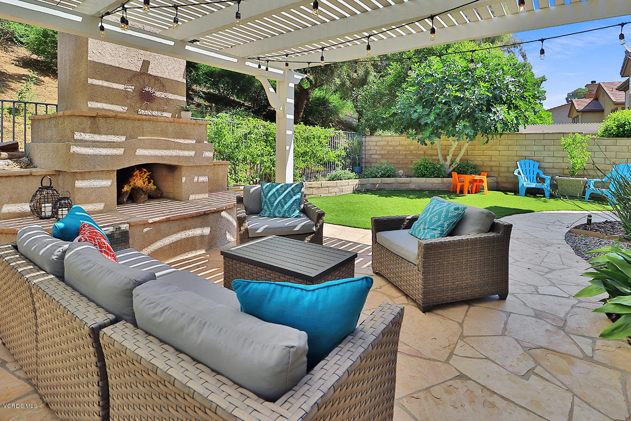 143 Brooks Road Simi Valley, CA 93065 - Photo 35 of 42 a view of a patio with couches and a fire pit