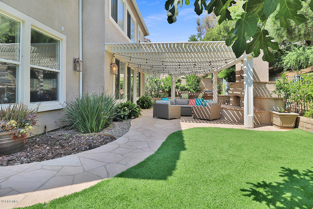 143 Brooks Road Simi Valley, CA 93065 - Photo 40 of 42 a front view of a house with garden
