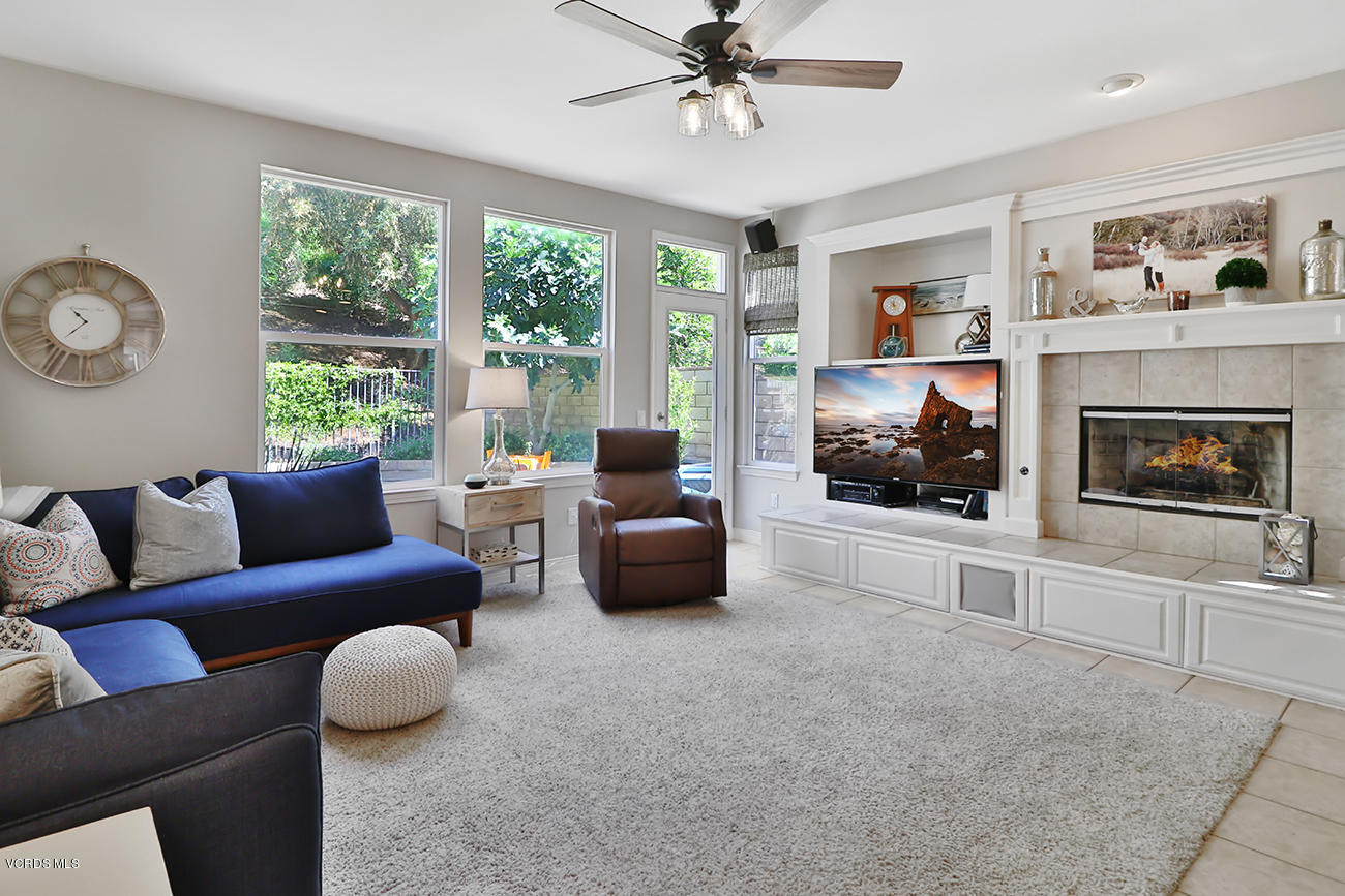 143 Brooks Road Simi Valley, CA 93065 - Photo 9 of 42 a living room with furniture and a fireplace