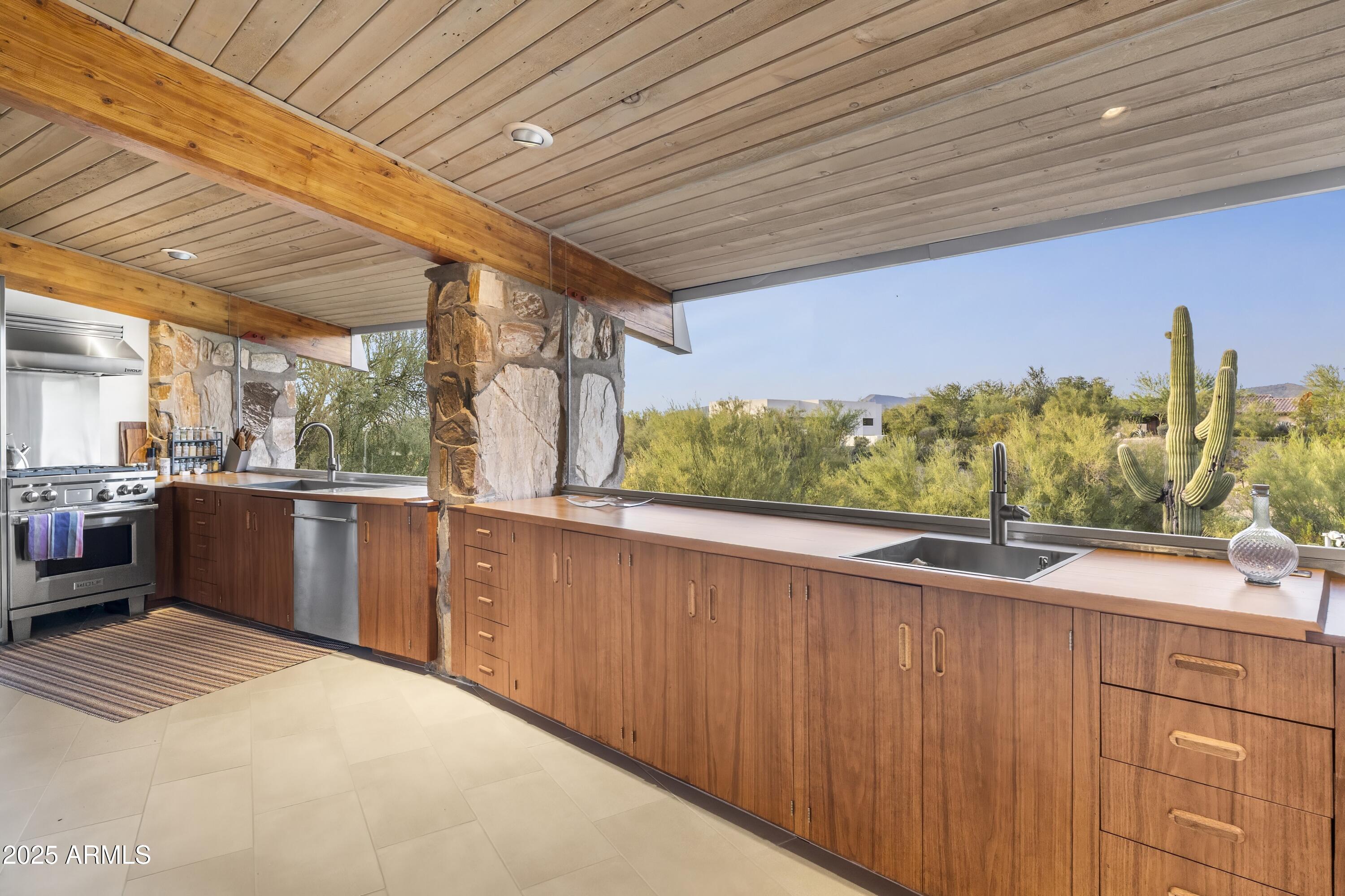 7915 East Primrose Path Carefree, AZ 85377 - Photo 12 of 46 Custom Walnut Cabinetry