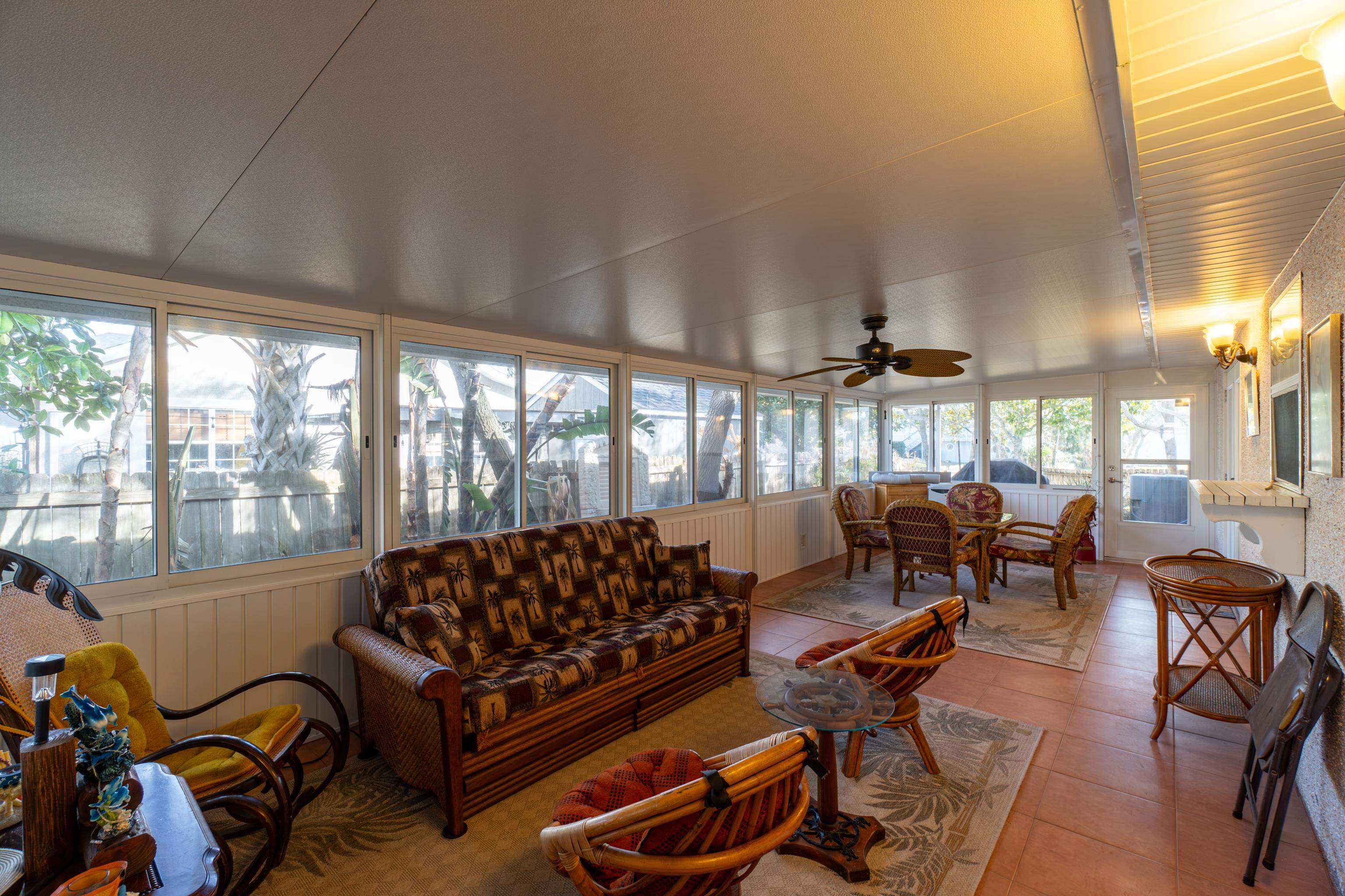 240 Micklers Road St. Augustine, FL 32080 - Photo 61 of 74 a living room with furniture and a floor to ceiling window