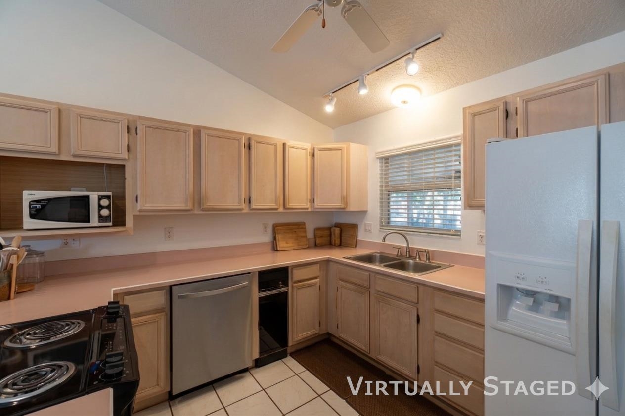 240 Micklers Road St. Augustine, FL 32080 - Photo 72 of 74 a kitchen that has a sink cabinets counter space and appliances