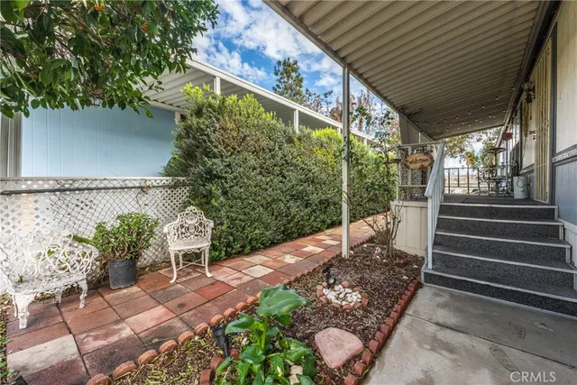 a view of yard with patio