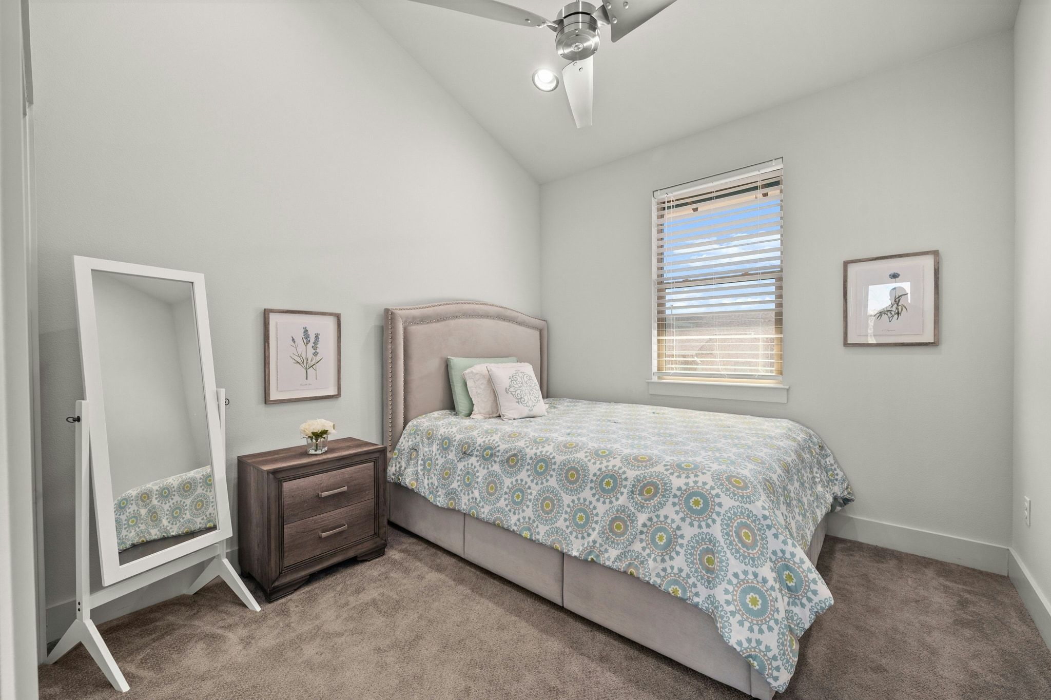 8110 Ranch Road 2222, Unit 92 Austin, TX 78730 - Photo 23 of 40 Carpeted room featuring a vaulted ceiling and a ceiling fan with integrated lighting