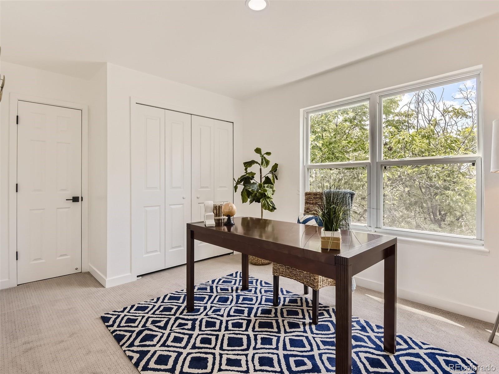 6222 Yale Drive Highlands Ranch, CO 80130 - Photo 17 of 32 a workspace with furniture and a window