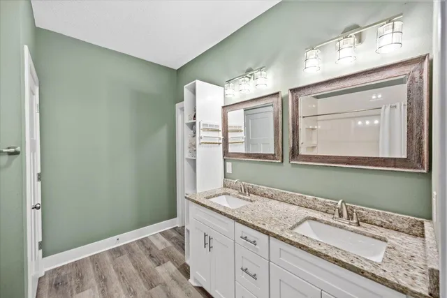 a workspace with furniture and a ceiling fan