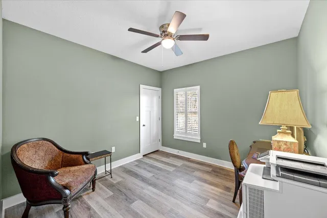 a view of a bathroom from the hallway