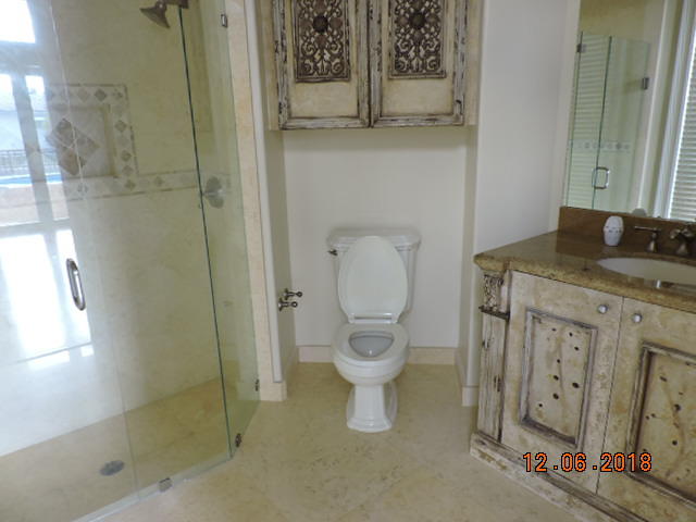 770 Coventry Street Boca Raton, FL 33487 - Photo 10 of 14 a bathroom with a granite countertop toilet and a sink
