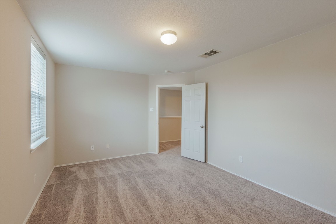 11532 Ashbrook Drive Manchaca, TX 78652 - Photo 19 of 30 a view of an empty room and window