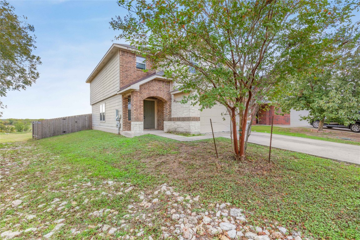 11532 Ashbrook Drive Manchaca, TX 78652 - Photo 28 of 30 a view of a house with backyard and trees