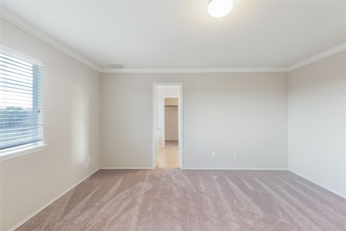 11532 Ashbrook Drive Manchaca, TX 78652 - Photo 9 of 30 an empty room with windows