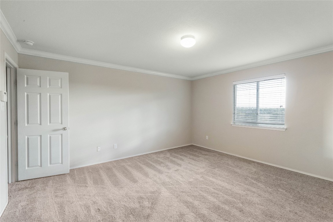 11532 Ashbrook Drive Manchaca, TX 78652 - Photo 10 of 30 a view of an empty room with a window