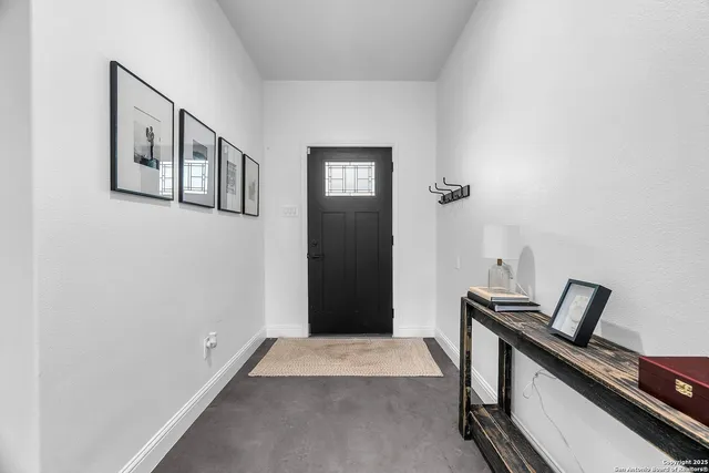 a view of a hallway with workspace