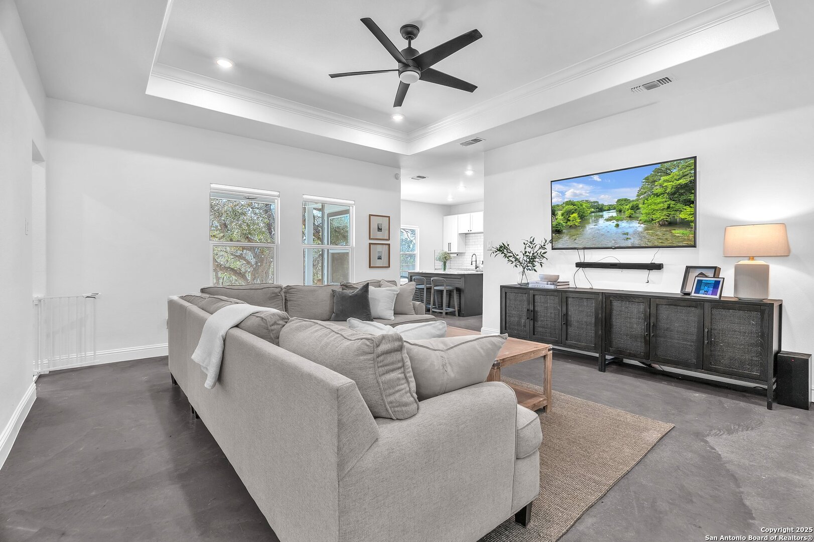348 Fawn Drive Spring Branch, TX 78070 - Photo 13 of 50 a living room with furniture and a flat screen tv