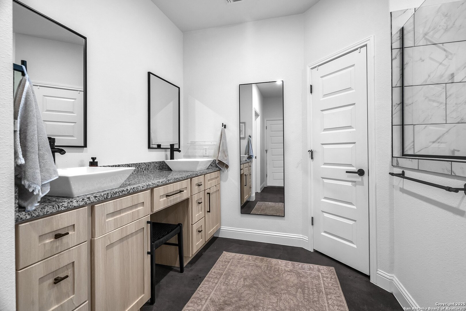 348 Fawn Drive Spring Branch, TX 78070 - Photo 33 of 50 a spacious bathroom with a granite countertop sink mirror and