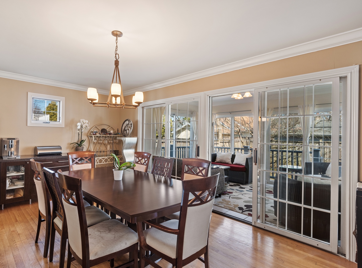 463 Green Bay Road Highland Park, IL 60035 - Photo 5 of 27 a view of a dining room and livingroom with furniture wooden floor a chandelier