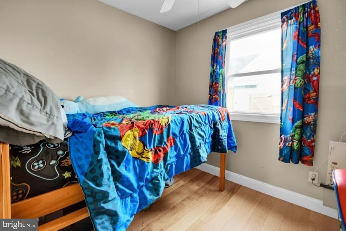 12 Trimble Boulevard Brookhaven, PA 19015 - Photo 12 of 34 a bedroom with a bed and a window